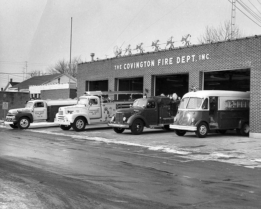 black and white photo of fire department vehicles