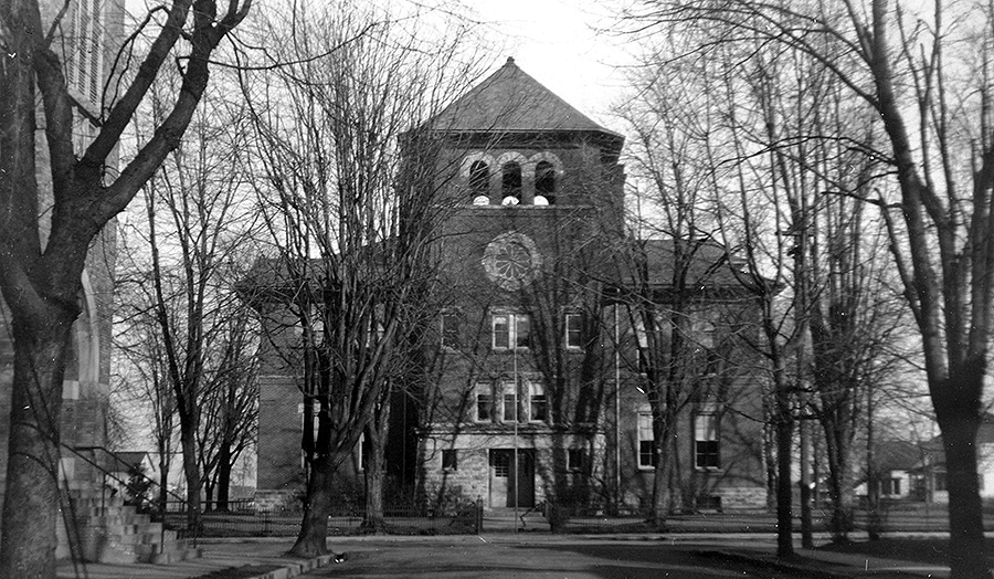 black and white photo of old school house