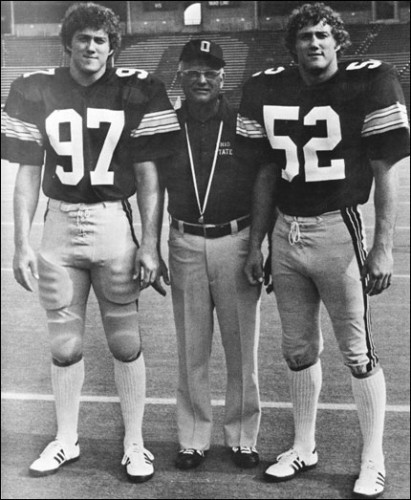 black and white photo of tim and terry vogler with coach
