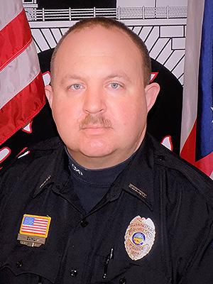 Aaron Zuhl, Police Officer
